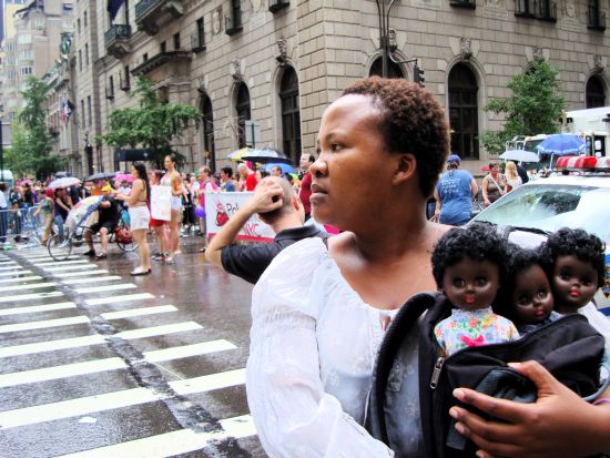 Click the image for a view of: The comforter: Fifth Avenue, New York, Annual Gay Parade I. 2008. Digital print. Edition 6. 418x520mm