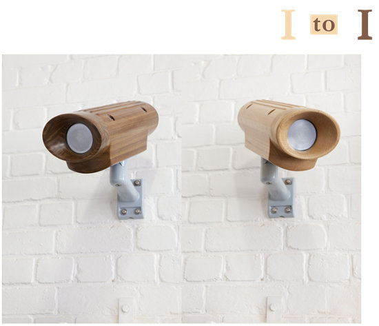 Click the image for a view of: Image: Security Camera (kiaat) & Security Camera (beech)  2015  Wood, stainless steel screws, aluminium bracket, enamel paint  395X300X150mm (kiaat) & 410X300X140mm (beech)