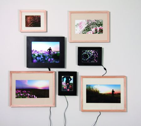 Click the image for a view of: Running Man. 2009.lithograph, giclee prints, LCDs with machinima, polyptych of 4 prints and 3 screens. edition 3. installation size varies